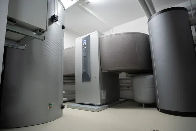 Efficient and innovative heat pump system in an indoor setting for advanced heating solutions. What a 200-amp panel upgrade costs for a heat pump in California